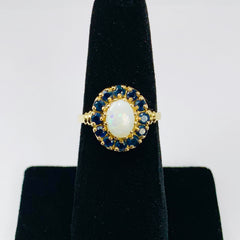 Vintage Woman's Opal and Blue Topaz Halo Ring 10k Yellow Gold - ONeil's Jewelry 